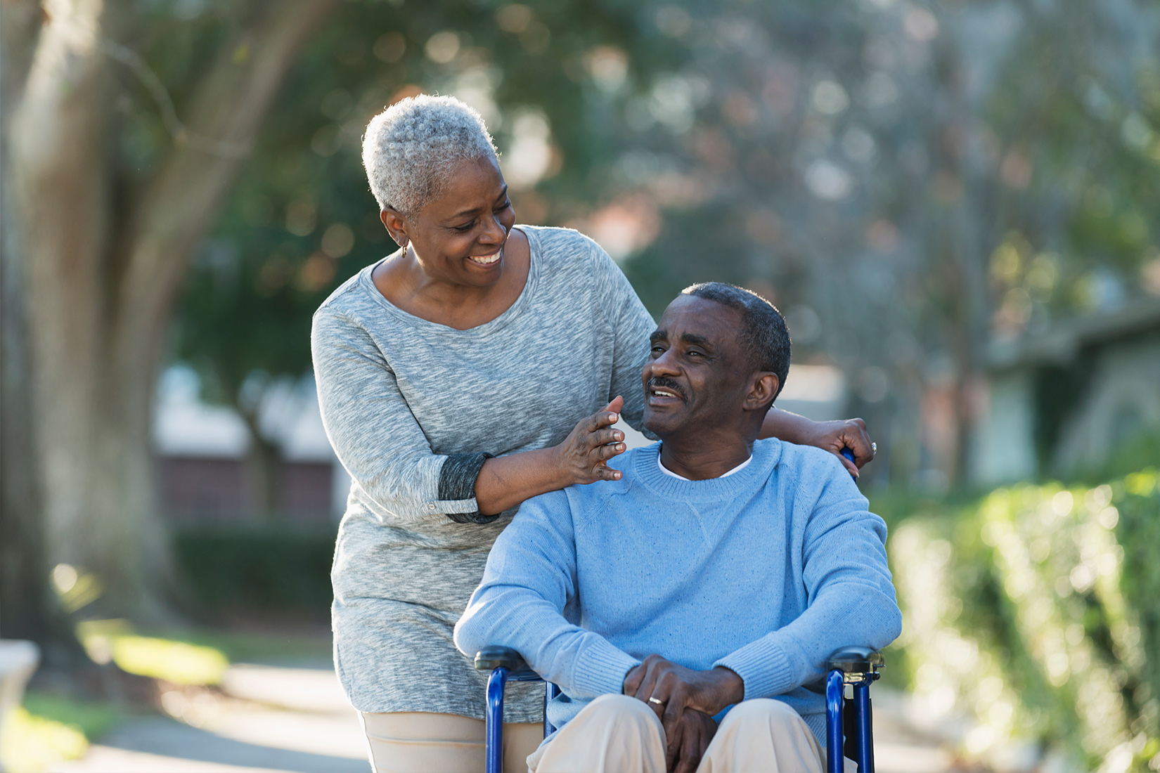 elderly couple on a walk outdoors