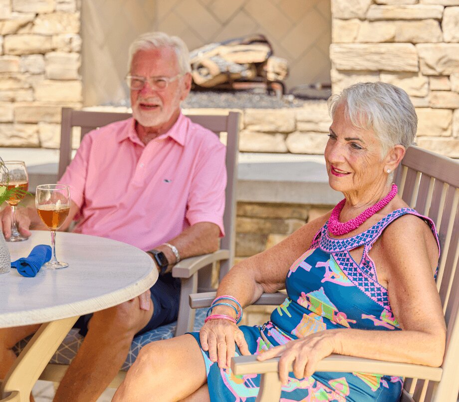 Senior couple lounging on the patio