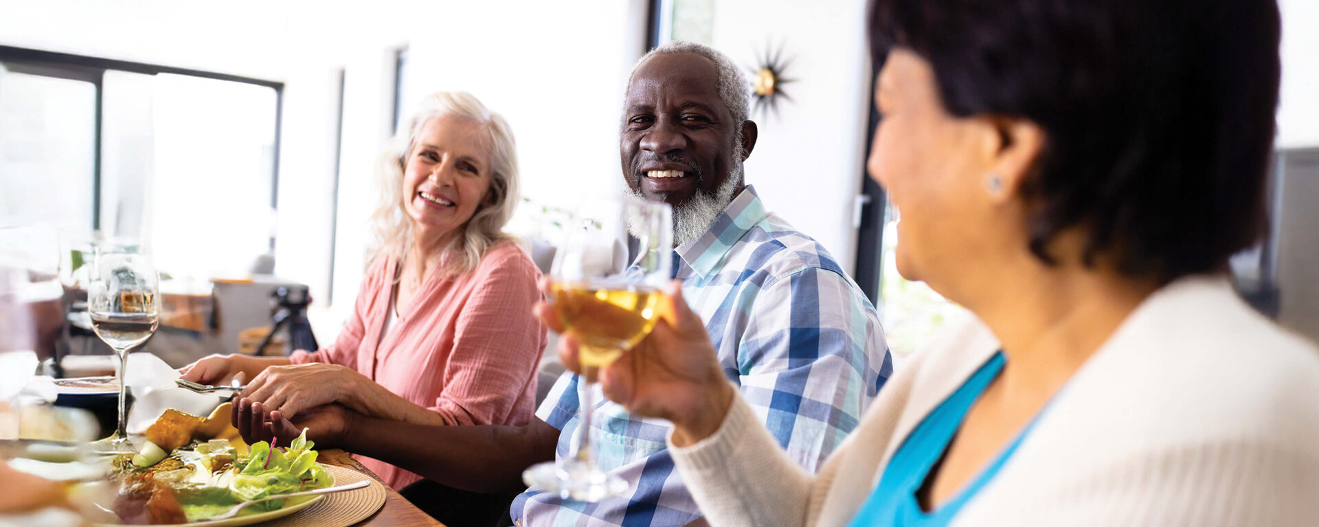 Seniors eating together