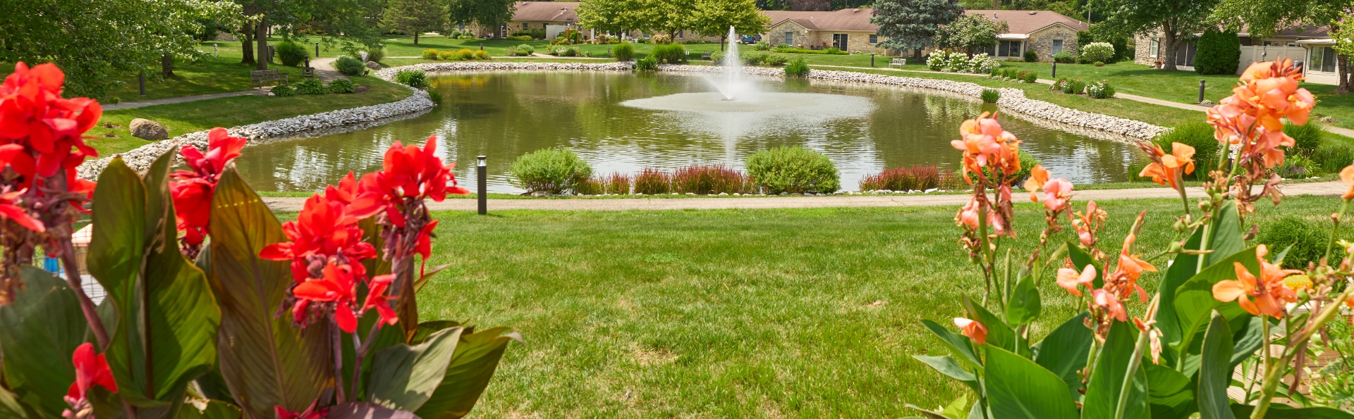 Garden with a fountain view at Marquette Senior Living