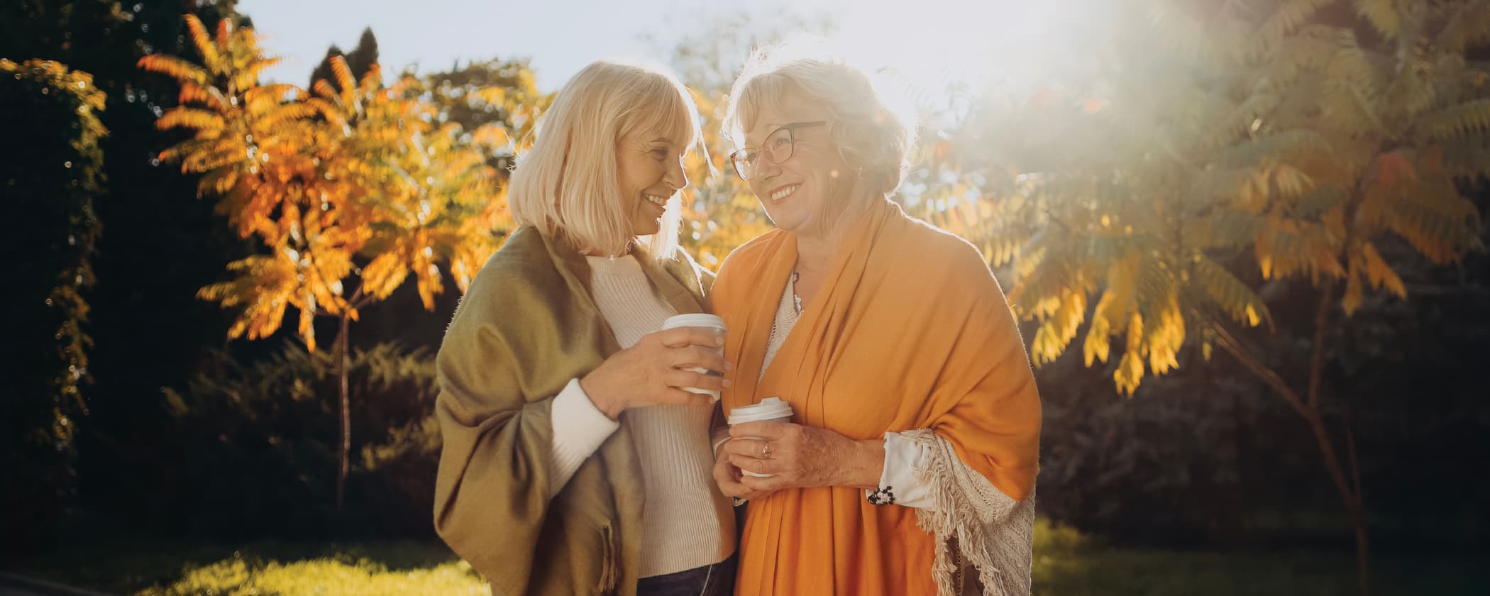 Senior women enjoying a coffee outdoors